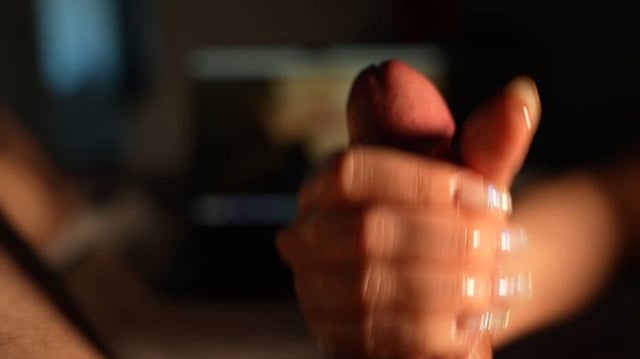 Stroking my husband’s cock while he watches a video of me fucking someone else…